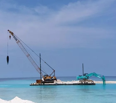 Piling barge in shallow water